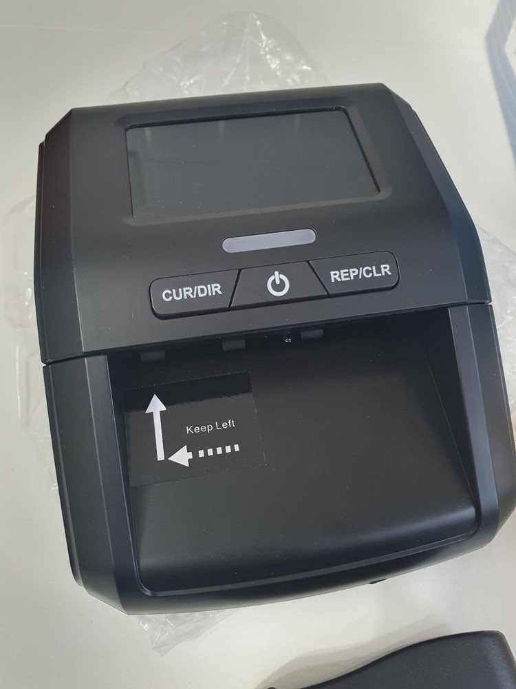 Counterfeit Bill Detector