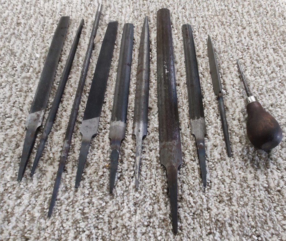 FILE SET WITH SCRAPER AND HANDLED PICK