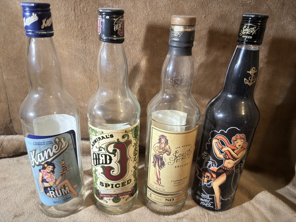 4 EMPTY RUM BOTTLES MIXTURE