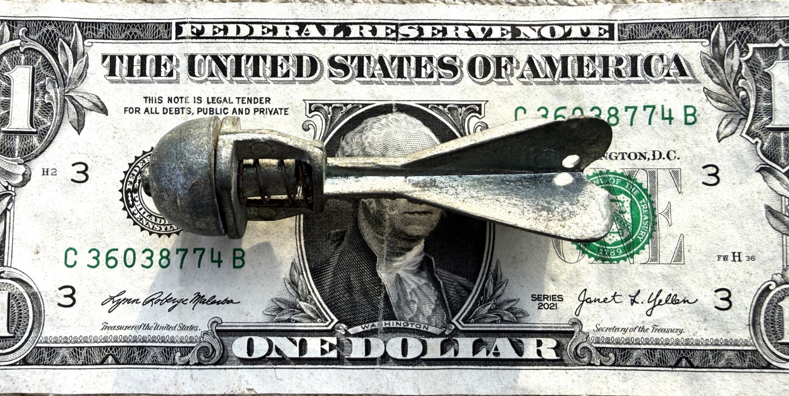 VINTAGE METAL CAP BUSTER THROWING TOY BOMB