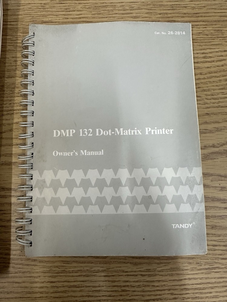 DeskMate TANDY USER REFERENCE MANUAL and DMP 132 Dot-Matrix Printer Manual.