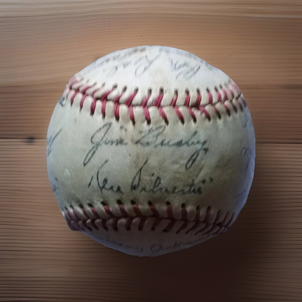 Signed Baseball /Henry Aaron + many players