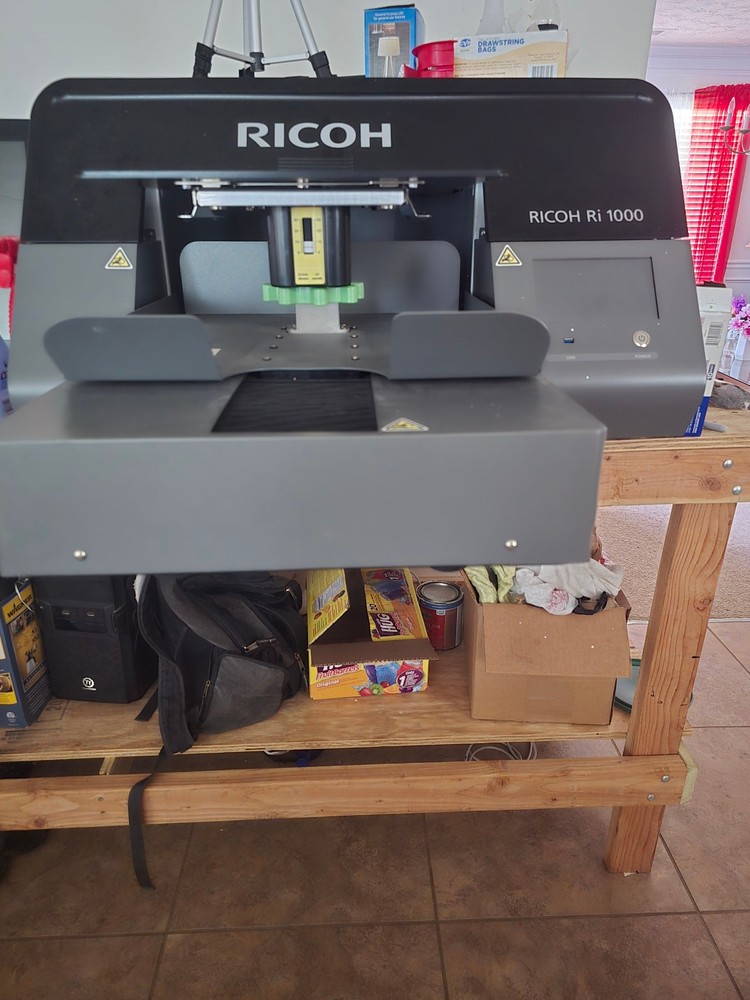 Ricoh RI-1000 DTG printer.