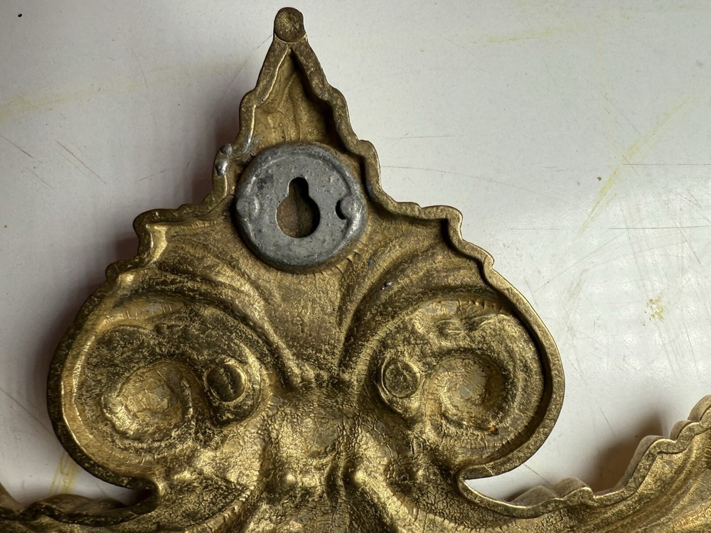 Brass Scrolling Pediment