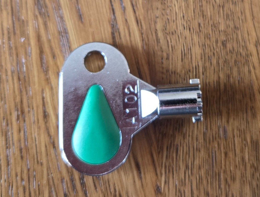 Pachislo slot machine door key with the code A102