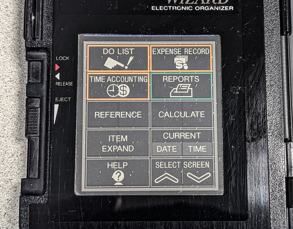 Sharp Wizard OZ-7000 Electronic Organizer with Time & Expense Manager Card