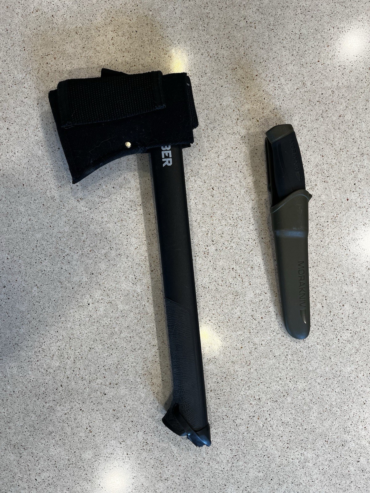 Gerber Hatchet Black Silver Plastic Handle with saw and a morakniv knife