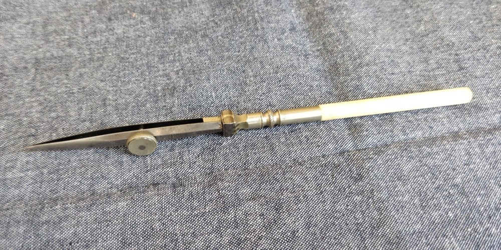 Vintage drafting Pen with white handle Bone?