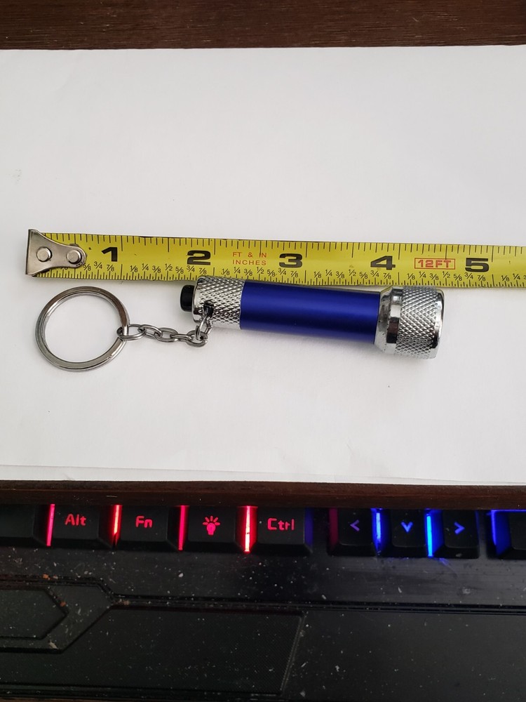 Robotic Flip Up Clip On LED Reading Book Light & Led flashlight key chain
