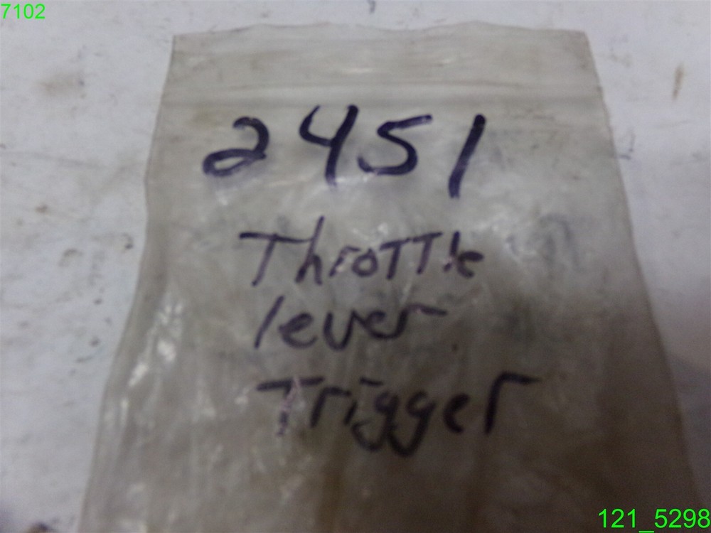 THROTTLE LEVER TRIGGER PART # 2451 - NEW