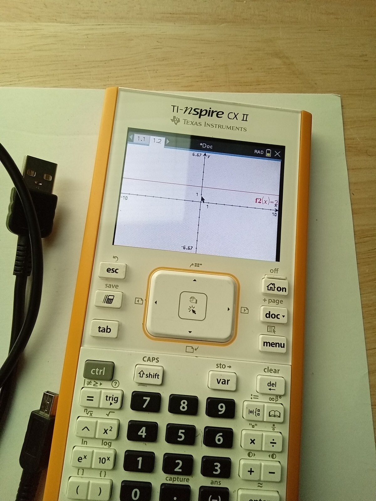 Texas Instruments TI Nspire CX II Graphing Calculator with charger USB cable