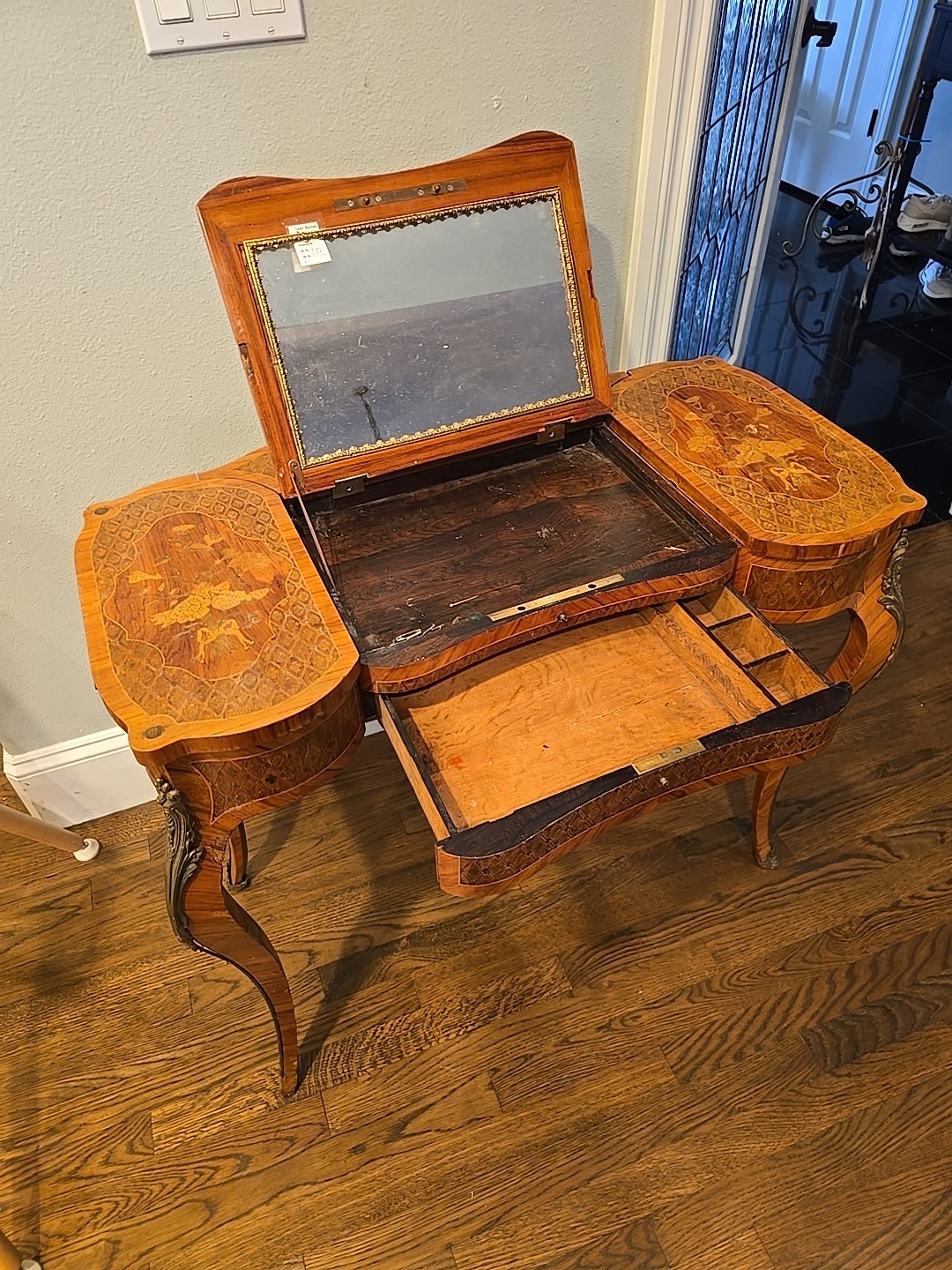 "Antique vanity table from the late 1800s with intricate inlay & a hidden mirror