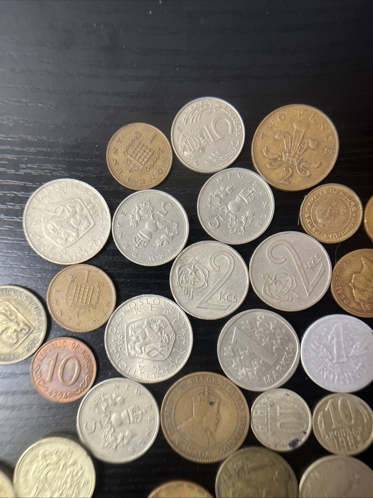 34 International Coins.