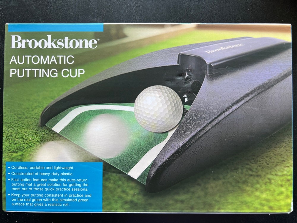 Brookstone  Automatic Return Putting Cup