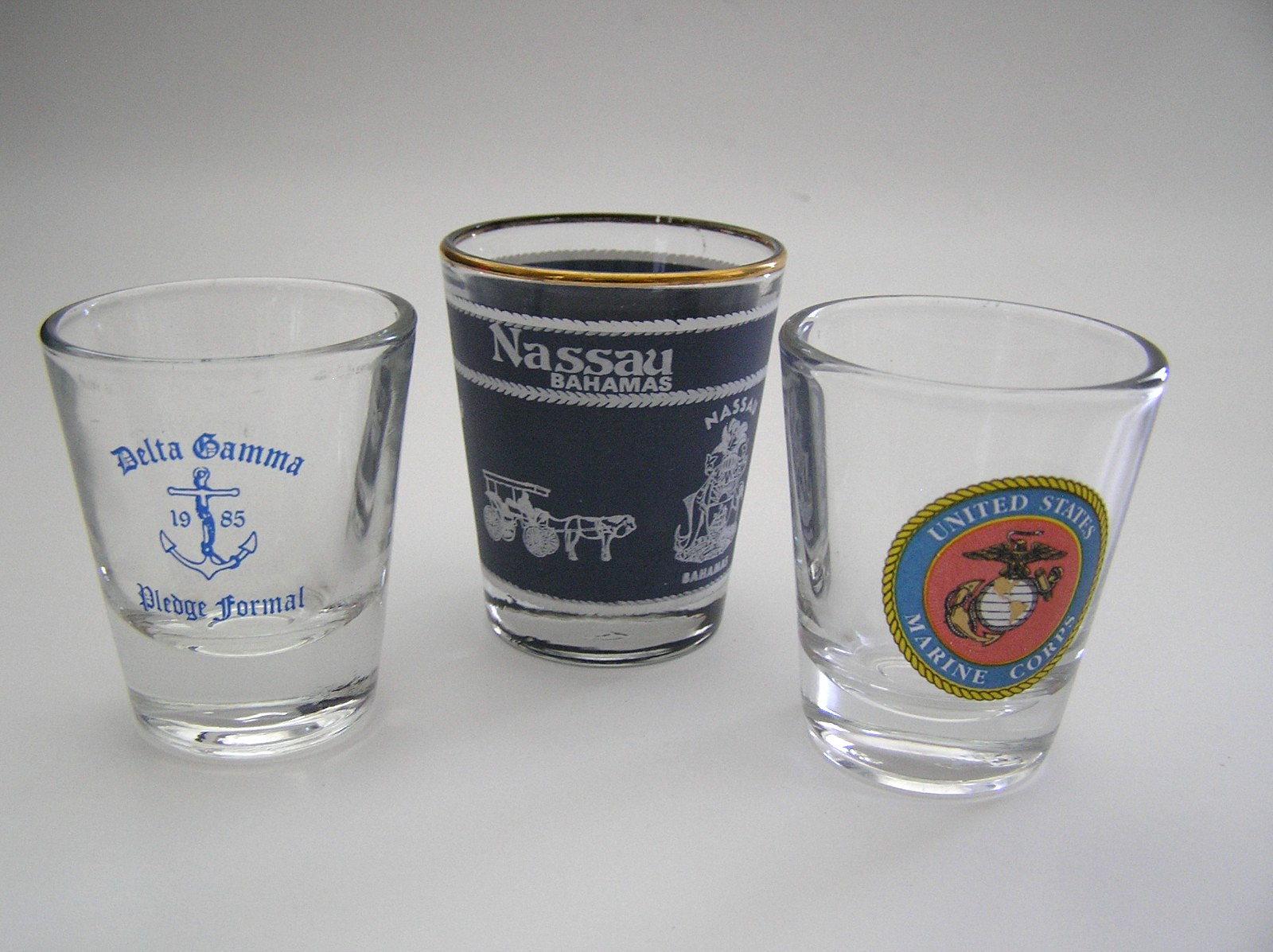 3 Shot Glasses: Nassau Bahamas, US Marine Corps Logo and Delta Gamma Sorority