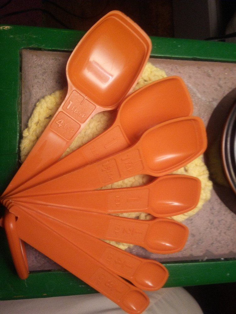vintage Tupperware measuring spoons burnt orange