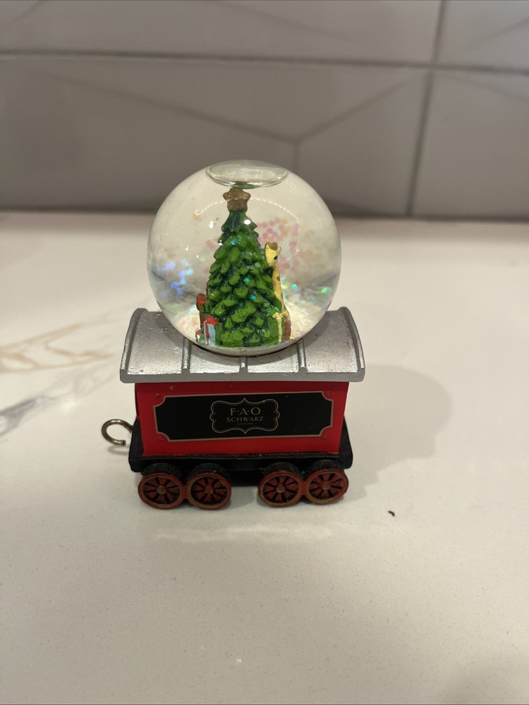 F.A.O SCHWARZ 4- piece Train Snow Globe Set