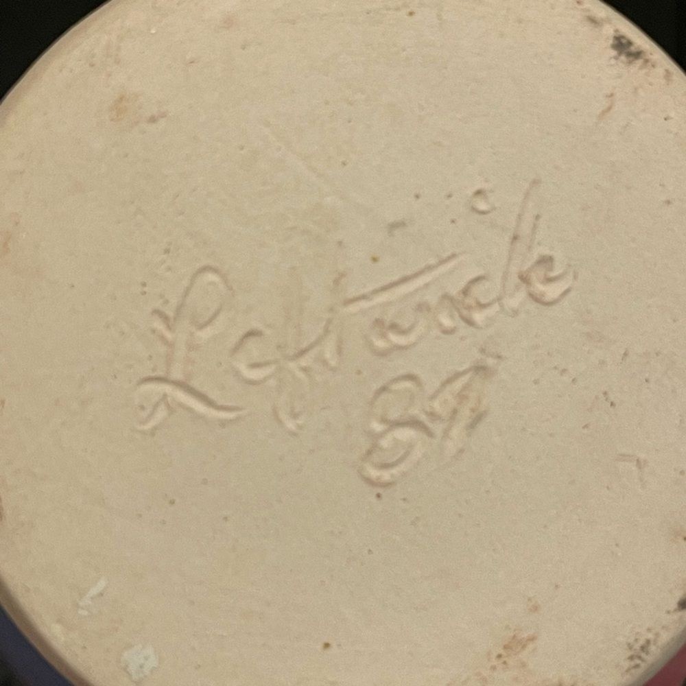 Light Blue Twisted Ceramic Small Vase and A Cream-Colored Base Signed Leftwich