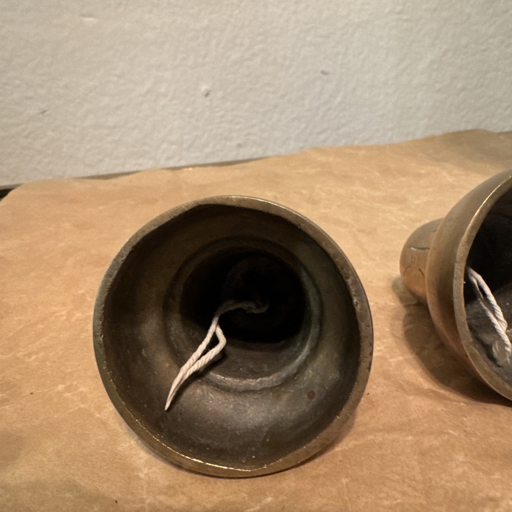 Vintage Brass bells with etchings x 2. Both missing clappers