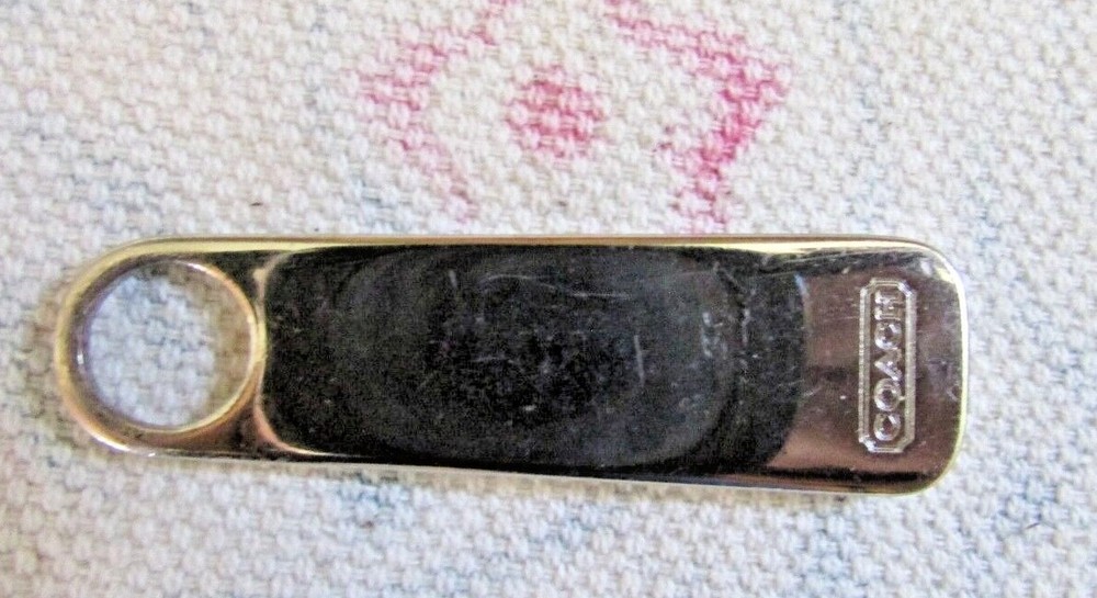 ASSORTED COACH ZIP PULLS  (sold individually)