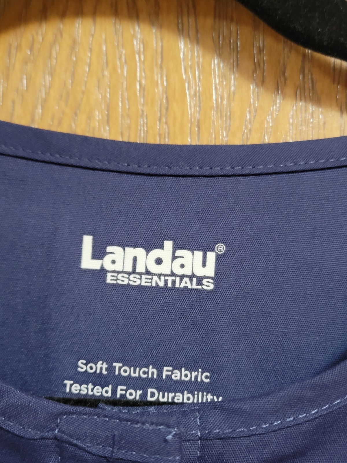 NWT. Med Unisex Long Sleeve Scrub Top/Jacket By Landau. Measurements Posted.