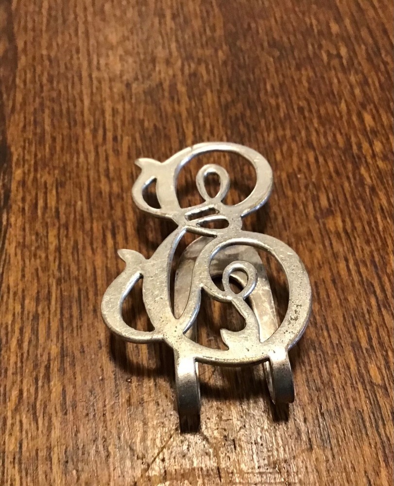 Vintage sterling Apollo initial napkin holder “E”