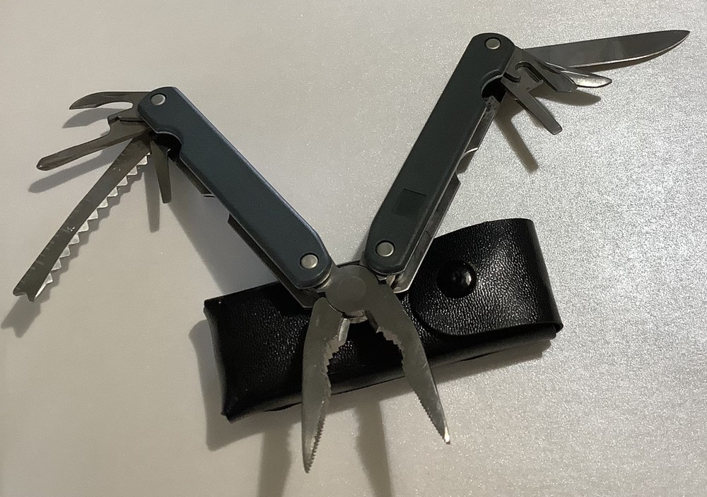 SALE $8 Multitool 8 Function Black Handle Not Branded In Case