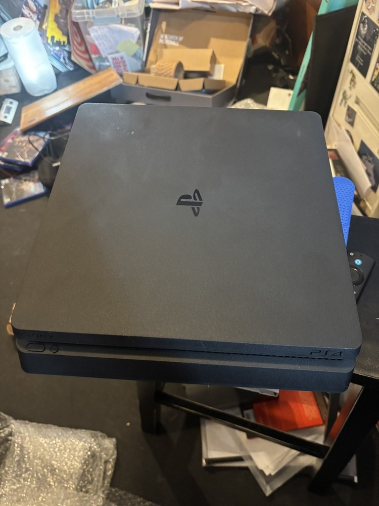 Playstation 4 Console with controller and seven games