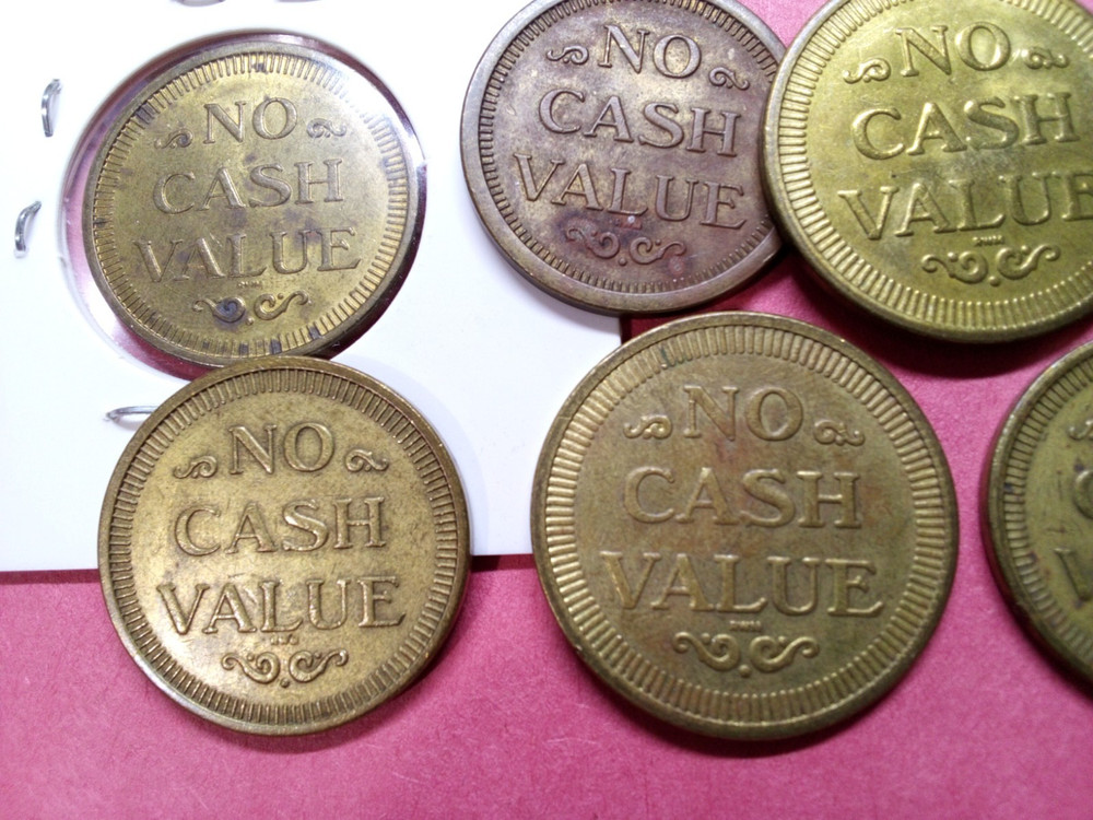 Discovery Zone-tokens (7) Tokens- 2 Sizes