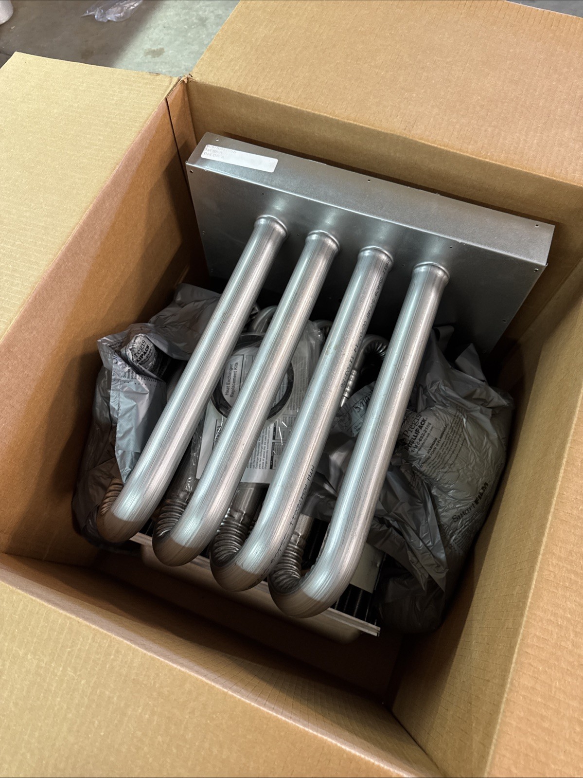 NEW, GOODMAN/AMANA, 0257F00329S, HEAT EXCHANGER ASSY. (STORAGE)