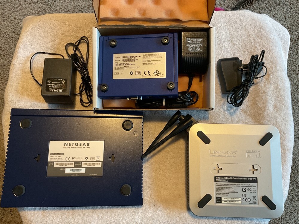 Misc. Older Routers Linksys, Netgear and Netscreen. 3 Total Routers