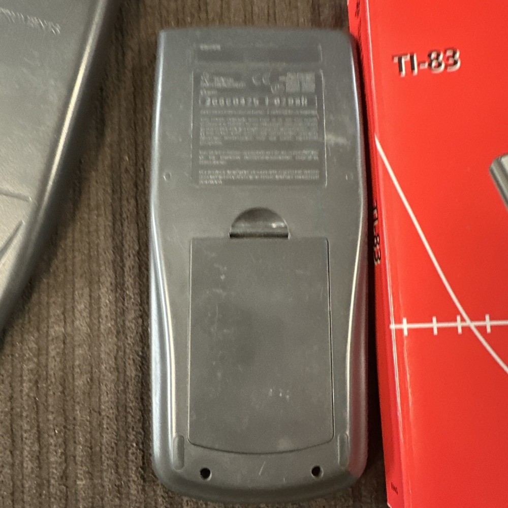 Texas Instruments TI-83 Graphing Calculator + Cover & guidebook tested