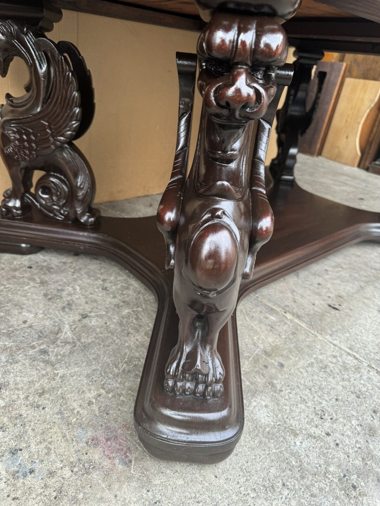 R. J. HORNER CARVED WING GRIFFIN LIBRARY TABLE
