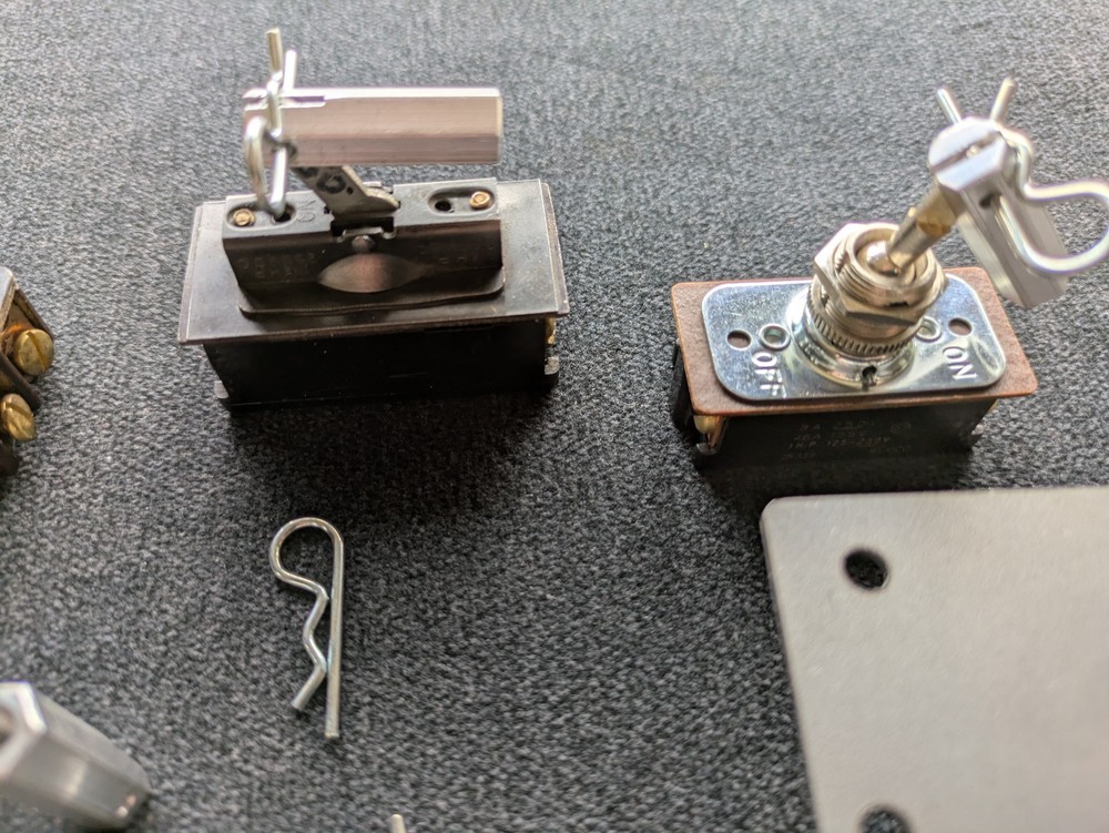 HEAVY DUTY DOUBLE POLE TOGGLE SWITCH - MACHINED WITH A FLAT BLADE HANDLE