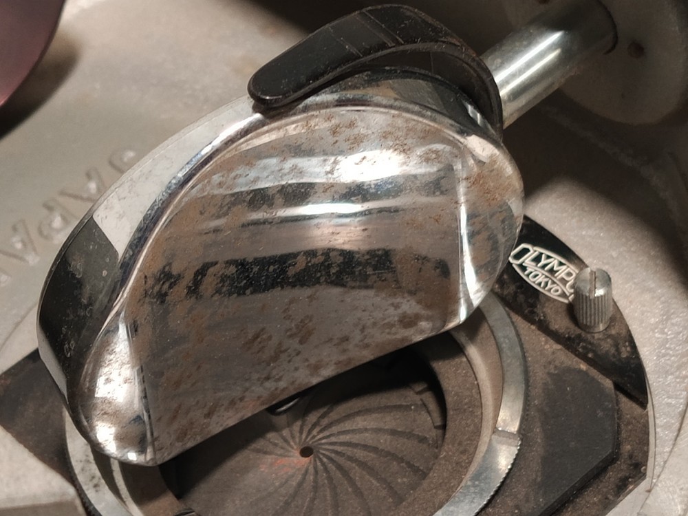 Olympus Tokyo microscope base w/ iris diaphragm, rotating stage, mirror shown