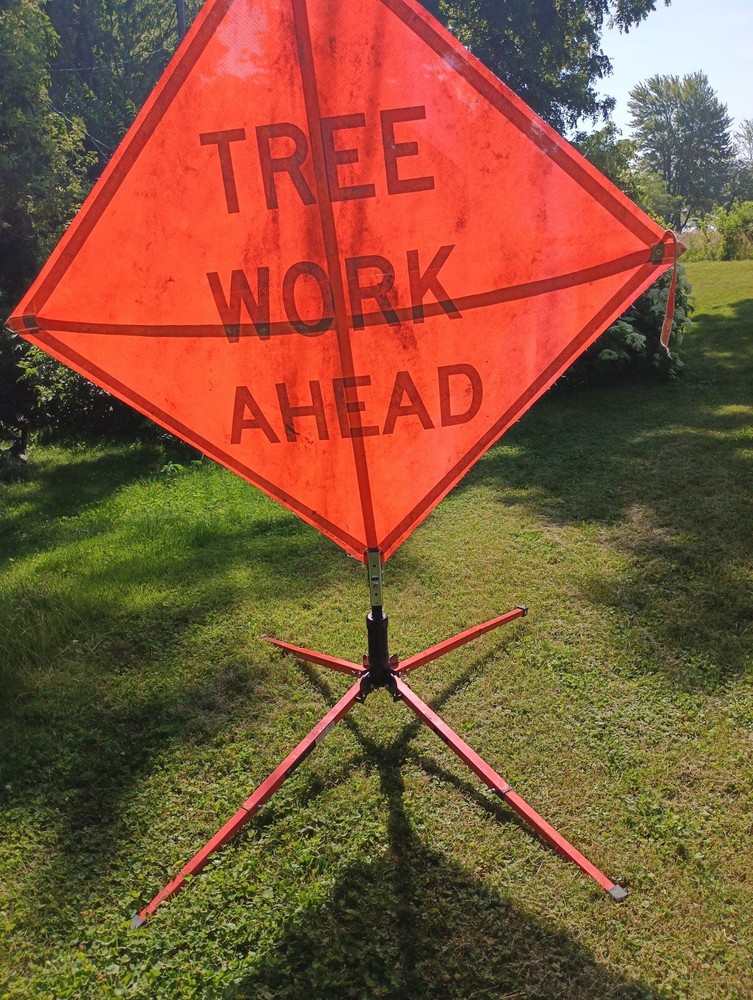 bone safety tree work roll up sign the orange version condition is good