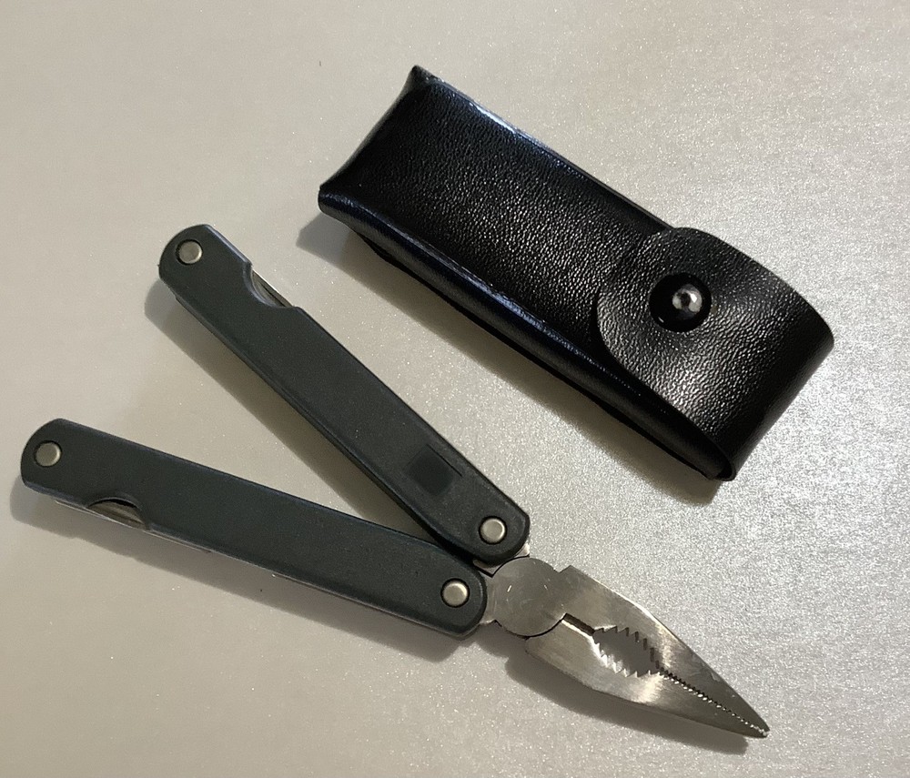 SALE $8 Multitool 8 Function Black Handle Not Branded In Case