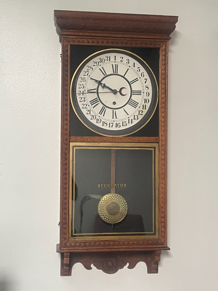 antique wall clock working
