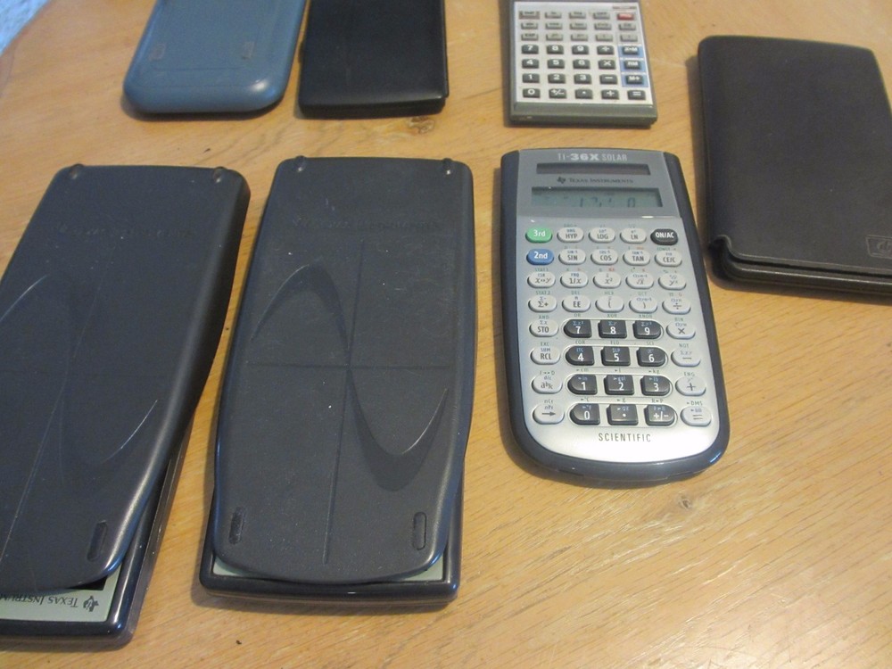 7 Calculators - Scientific - HP - Sharp - Texas Instruments - TI . quantity 7
