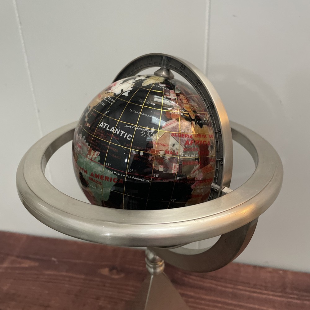 Rotating World Globe On Pyramid