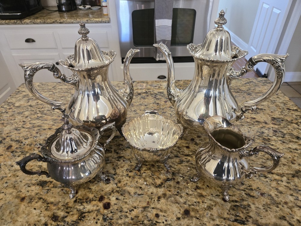 Wallace 1200 sterling silver plate.  5pc. comlplete tea service, nice condition!
