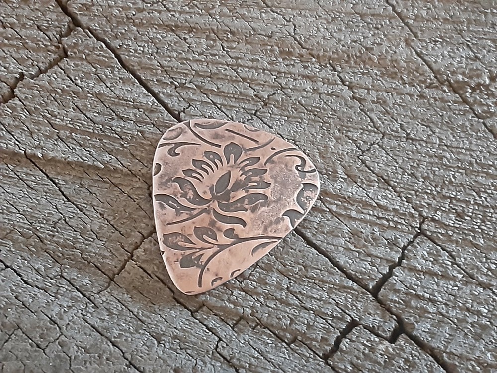 rustic copper guitar pick - playable and handmade - large floral pattern
