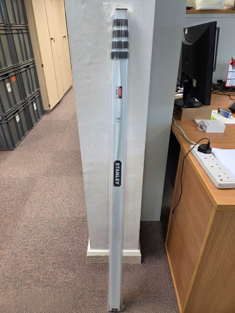 Stanley surveyors measure stick