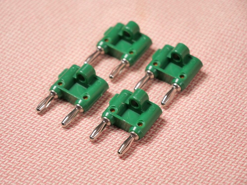 Four Pomona MDP Stackable Double Banana Plug with Cable Guide 4 Pack Green