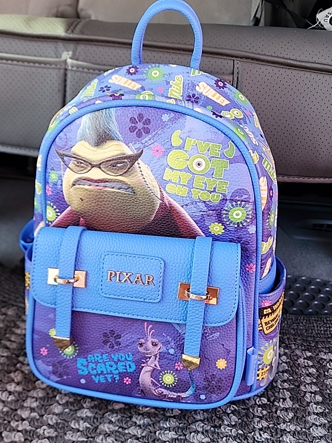Disney Pixar Monsters Inc. Roz Got My Eye On You 11" Vegan Leather Mini Backpack