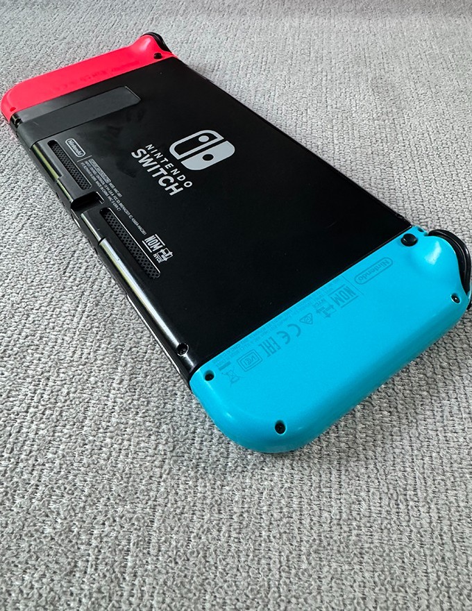 Nintendo Switch Console Plus Neon Red and Neon Blue Joy-Con set