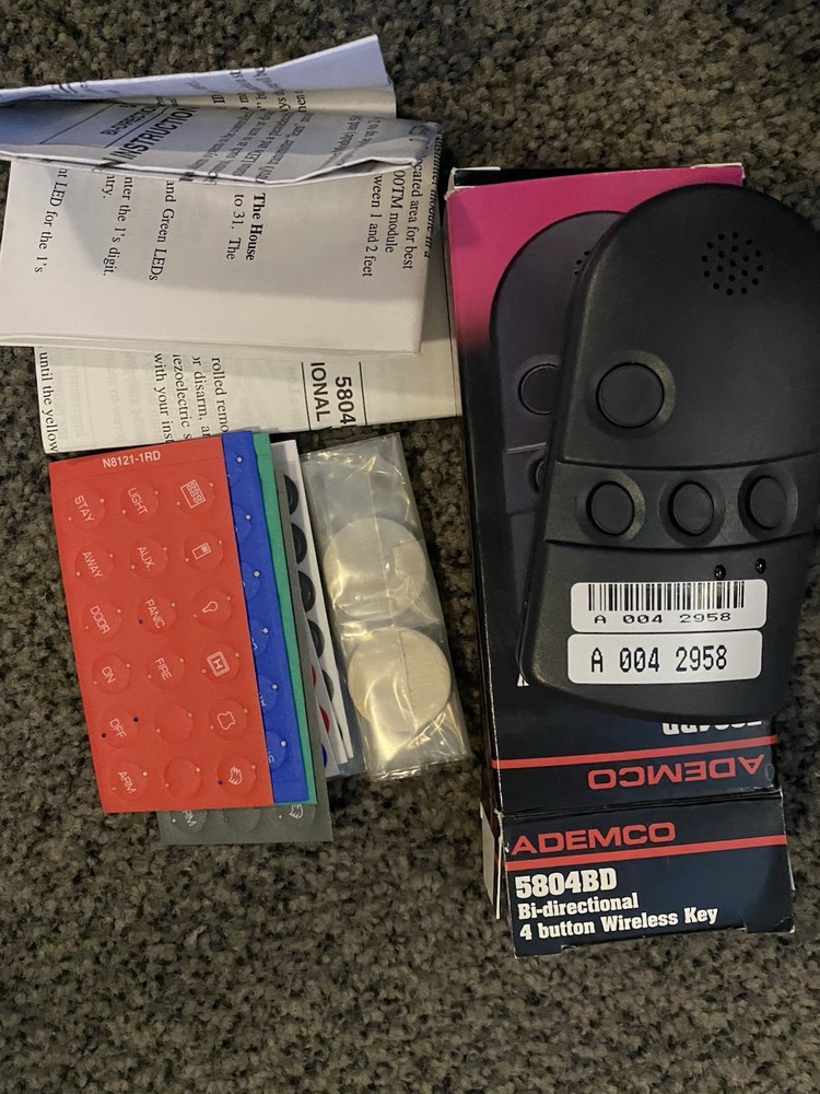 5804BD BI-DIRECTIONAL 4 BUTTON WIRELESS KEY ..open box