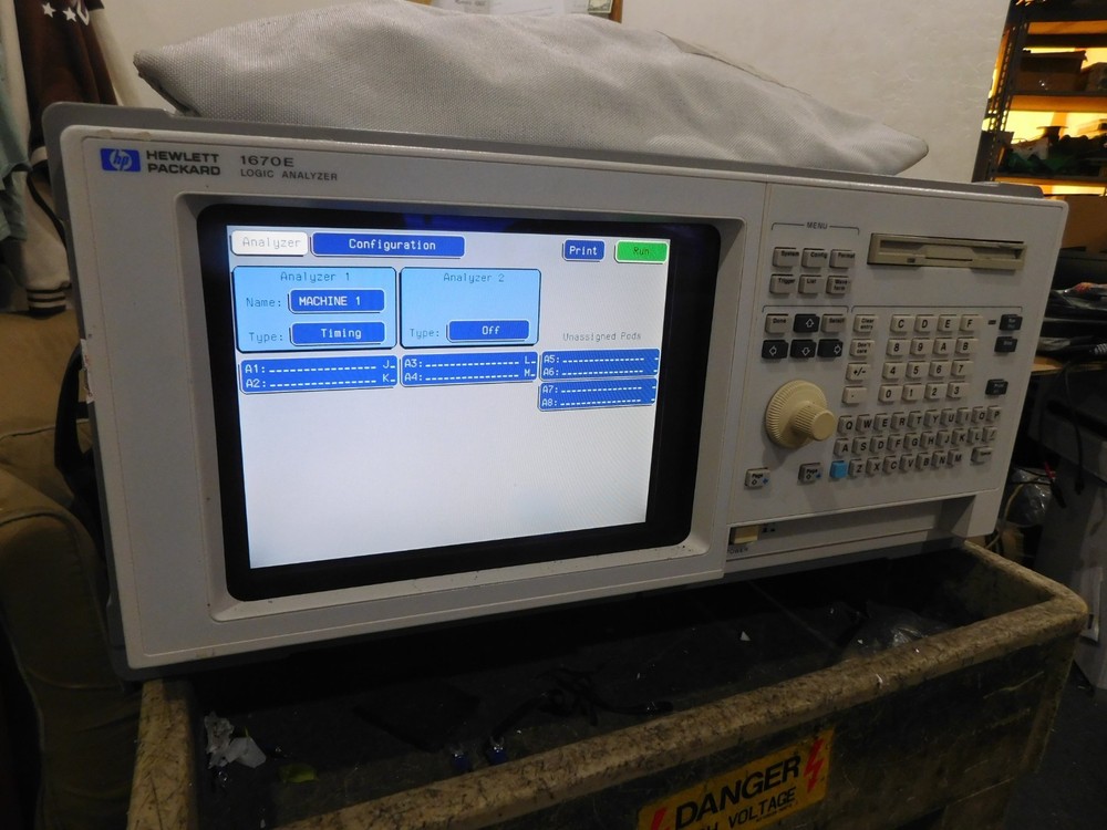 Hewlett Packard Model: 1670E Logic Analyzer with  Accessories Pictured