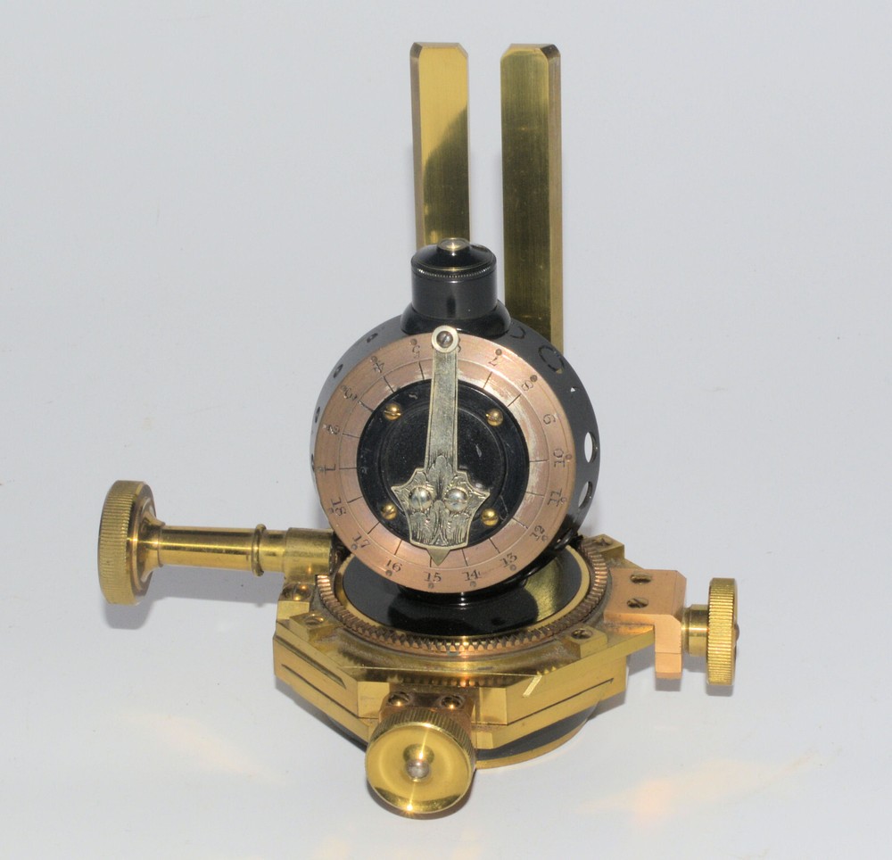 Very large binocular microscope in case with accessories.