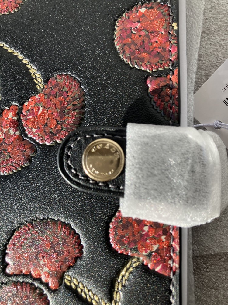 NWT Coach Notebook Cherry with gold/black multi 100% authentic. Purchased direct